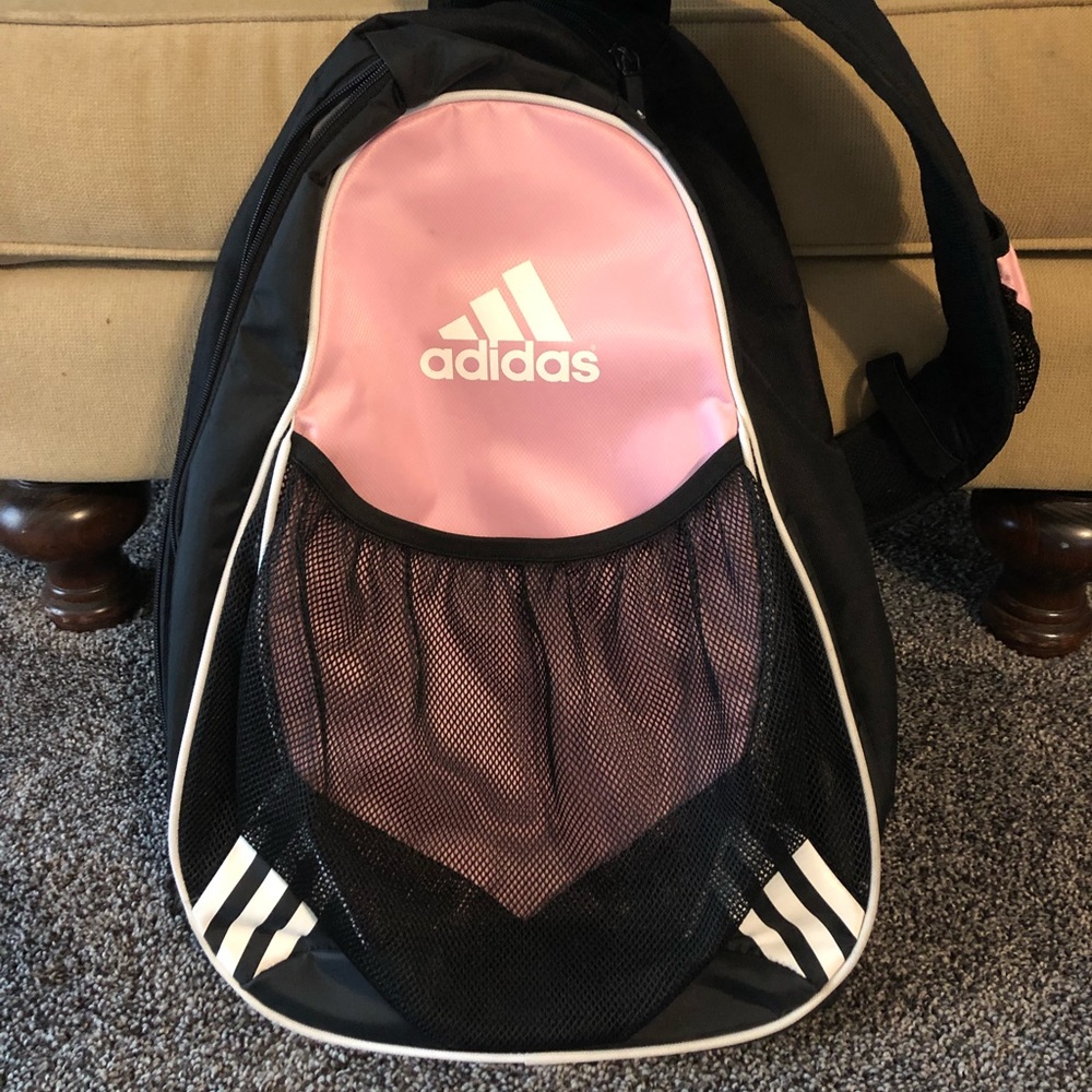 Adidas backpack. Very gently used. One strap side strap. Holds sports ball.